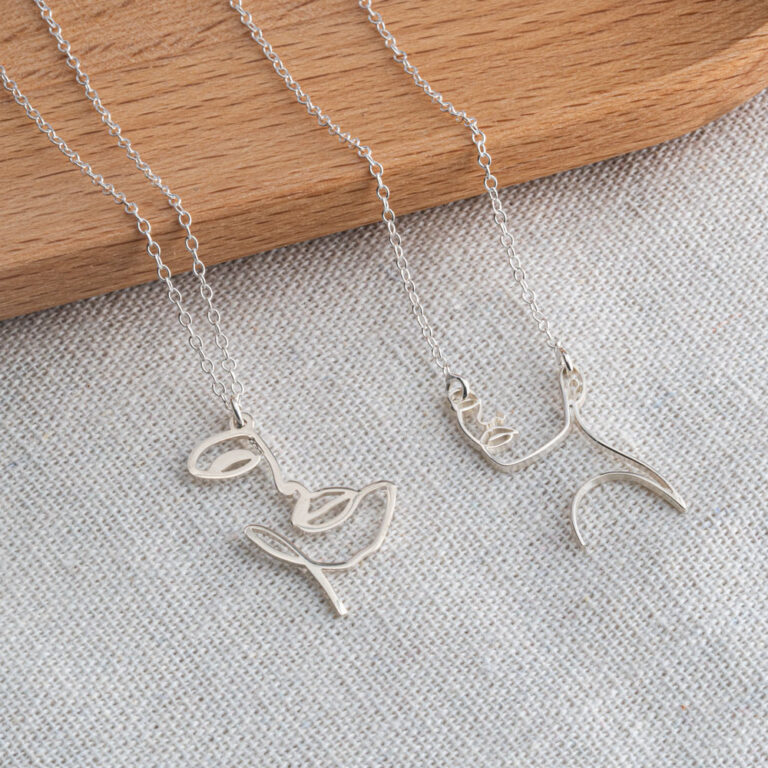 Line Art Woman's Face Necklace